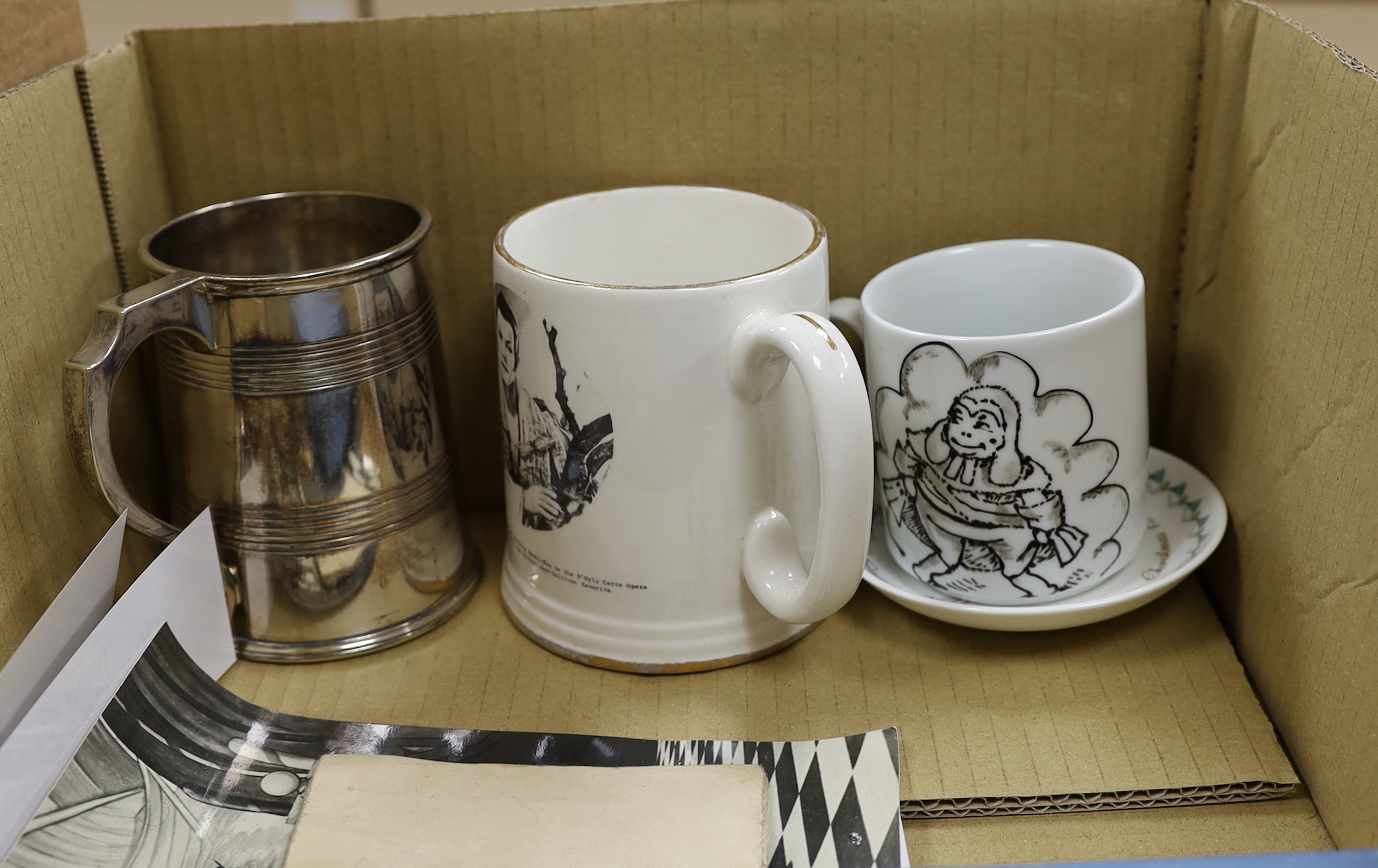 Gilbert & Sullivan and D’Oyly interest; a collection of ceramics, puppets, photographs, etc. including a Nanki Poo Toby jug, a D’Oyly Carte engraved pewter mug, a ‘Ninky Poo’ gramophone operated Clog Dancer, etc.